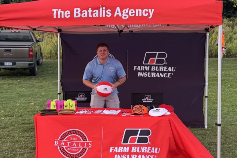 Austin under his agency tent